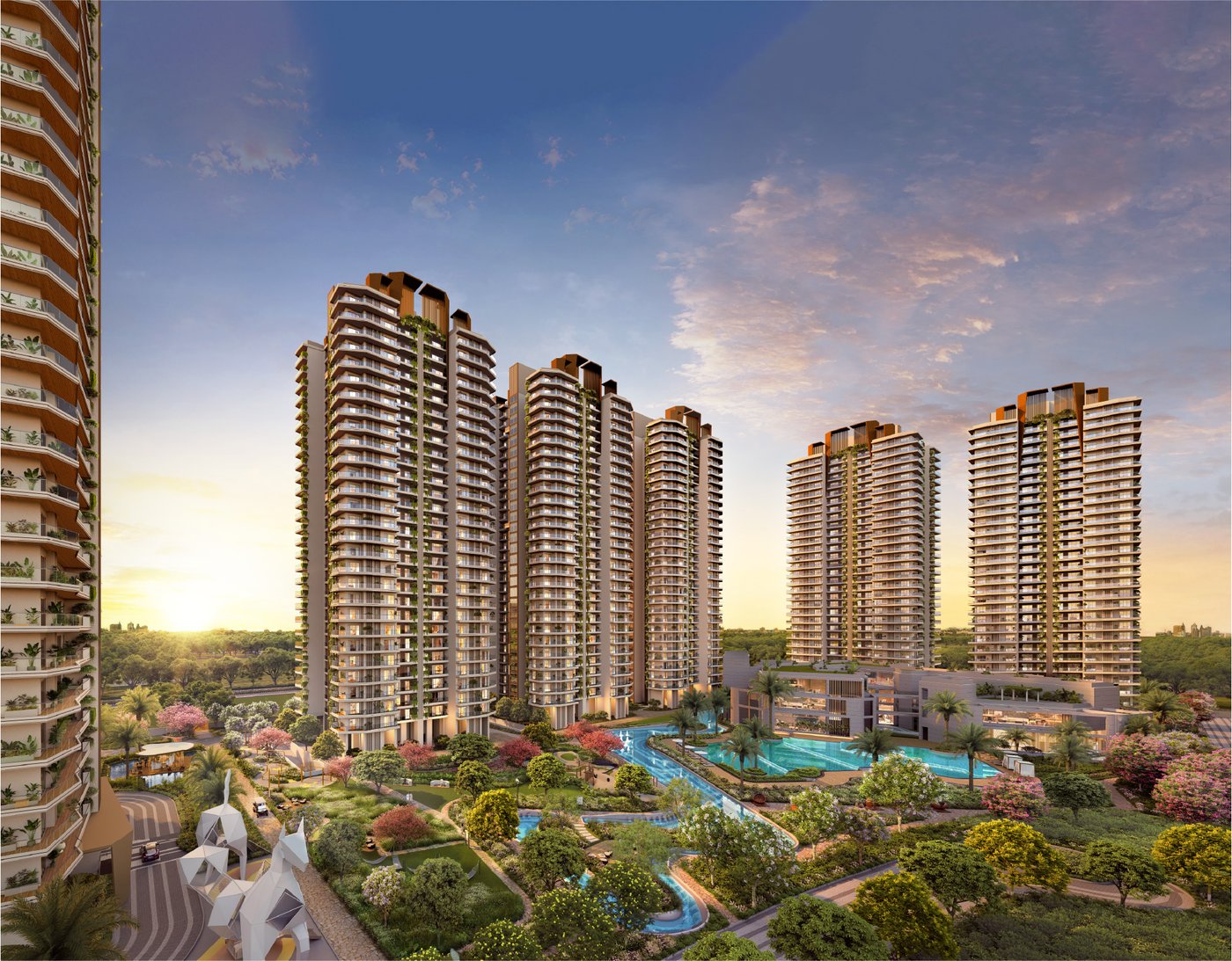 Cocoa County residential towers at sunset overlooking landscaped gardens and pool
