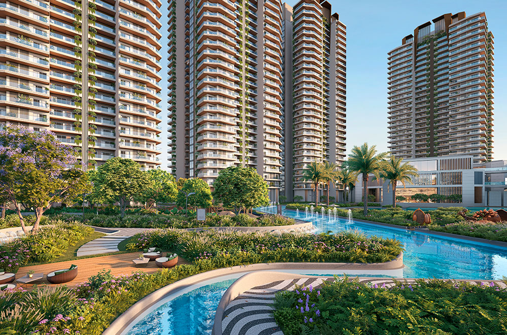 Water rivulet winding through the landscaped podium with towers beyond